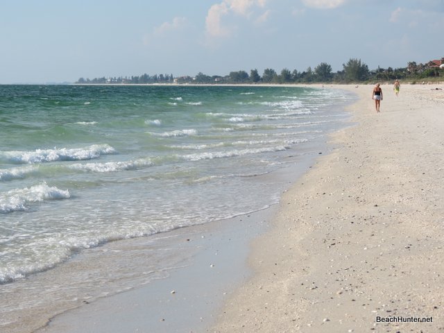 Walking on a quiet beach on Casey Key, FL